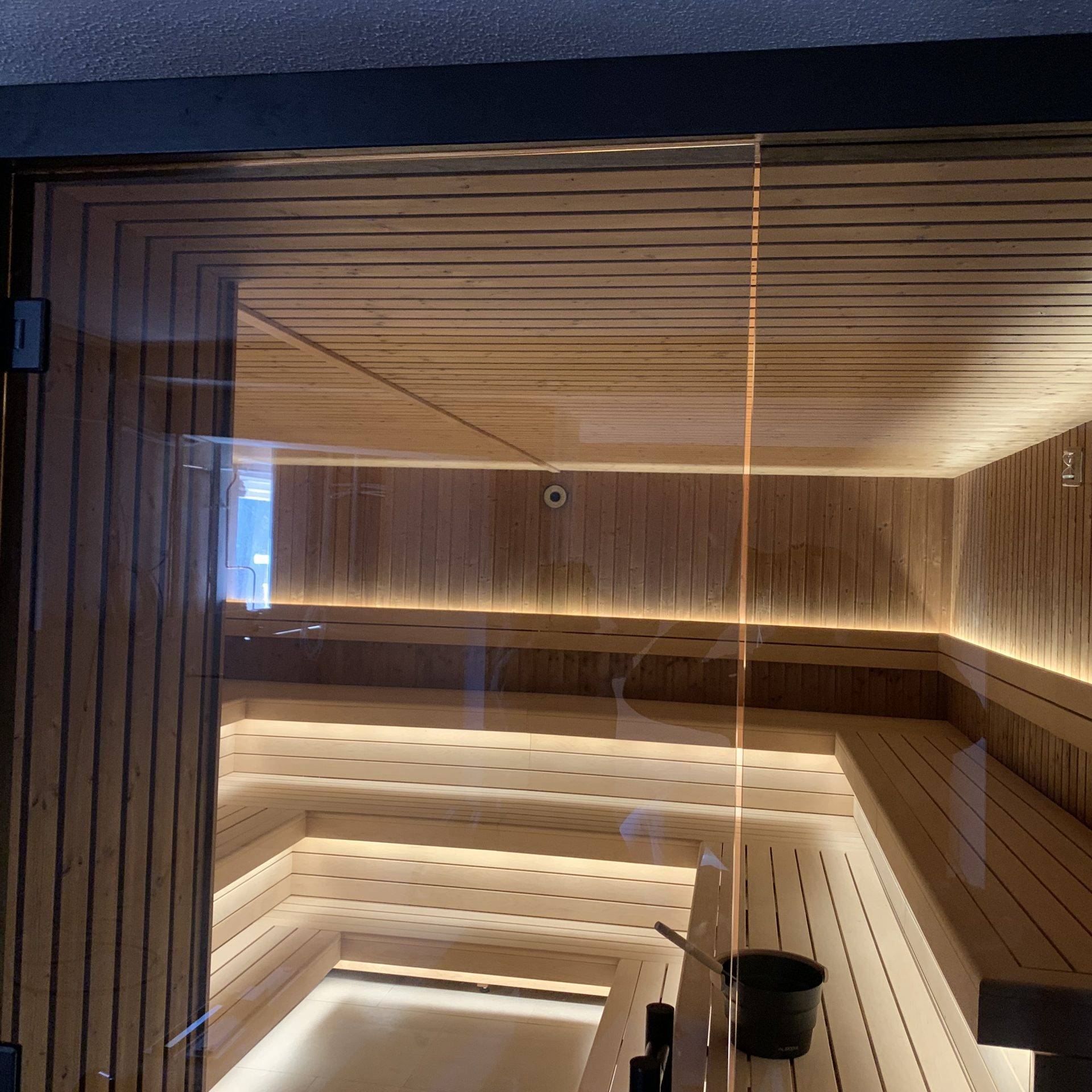 Luxury indoor sauna with LED lighting designed for relaxation and heat therapy