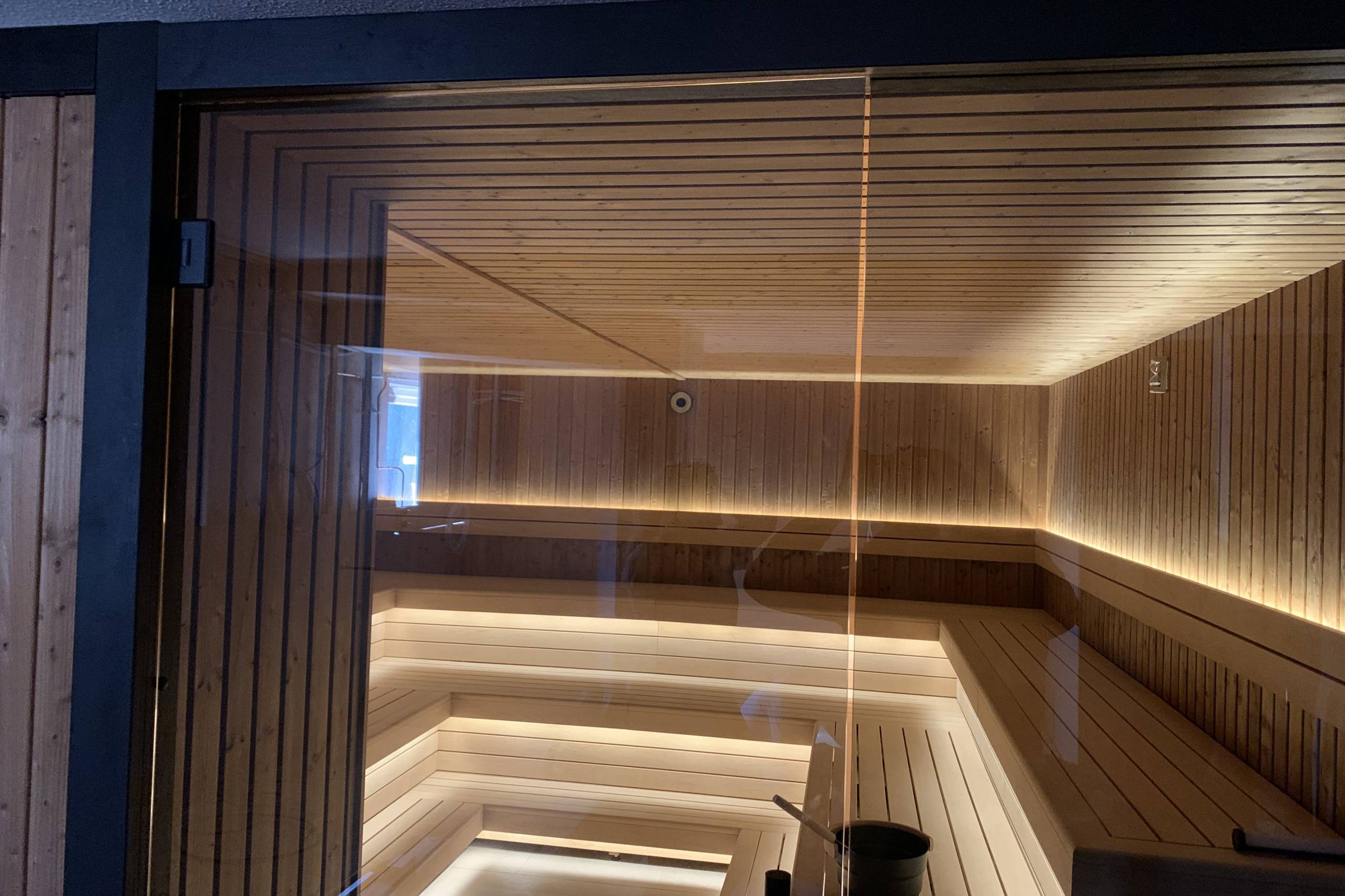 Luxury indoor sauna with LED lighting designed for relaxation and heat therapy