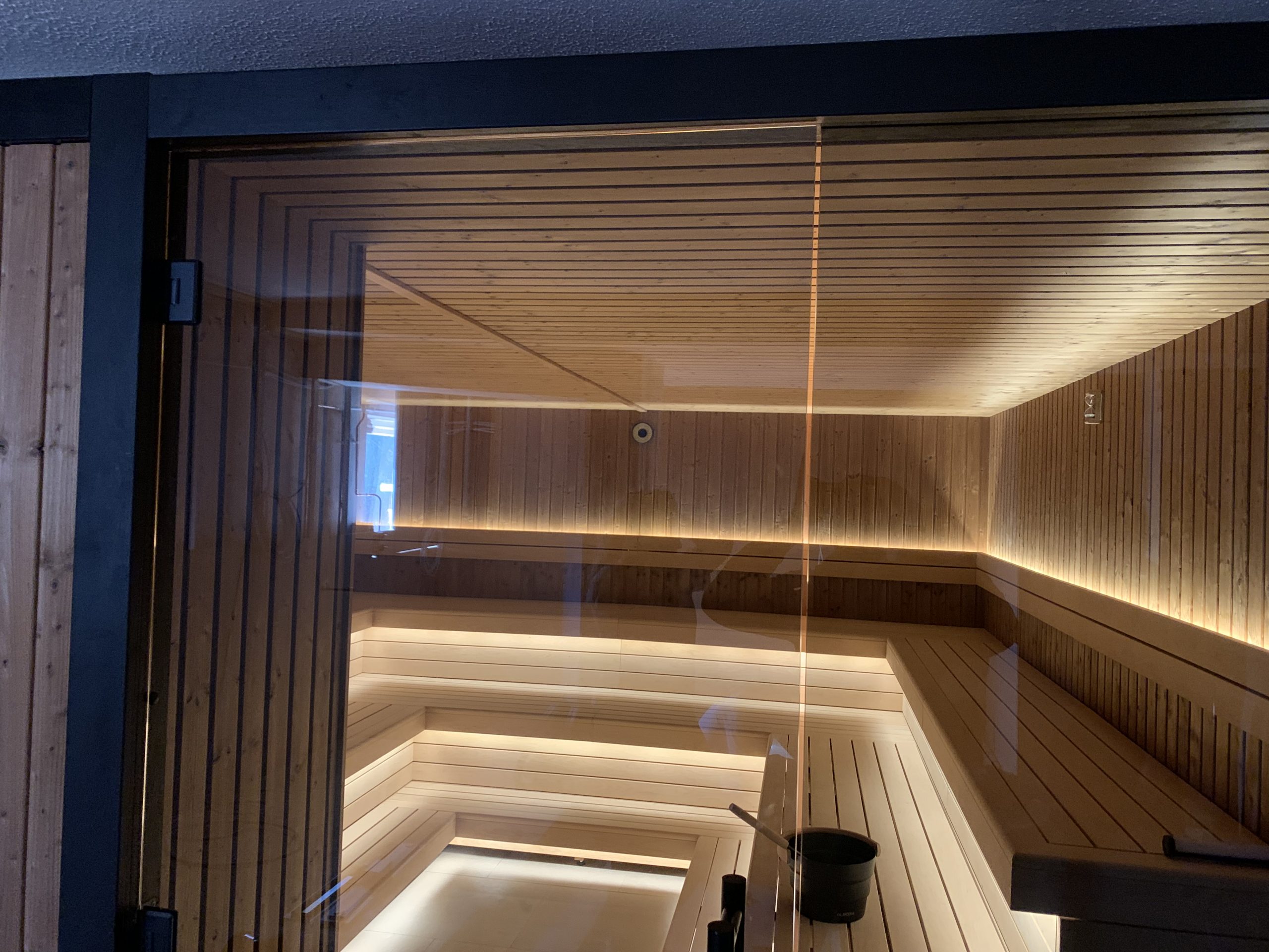 Luxury indoor sauna with LED lighting designed for relaxation and heat therapy